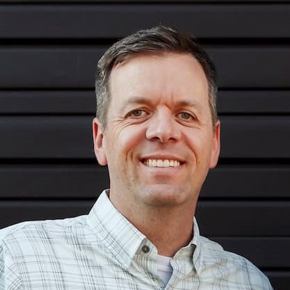 Matt McComas smiling in a headshot portrait